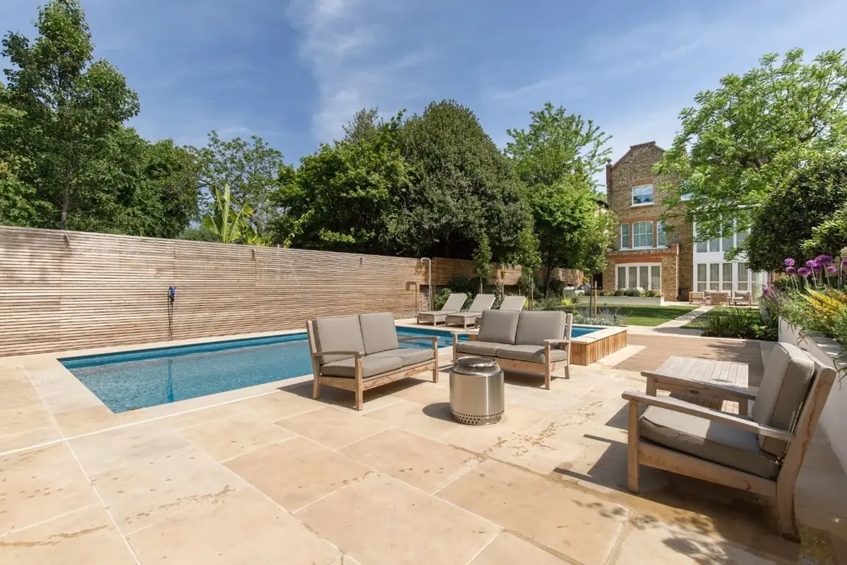 Macaulay Road poolside seating looking back to the house